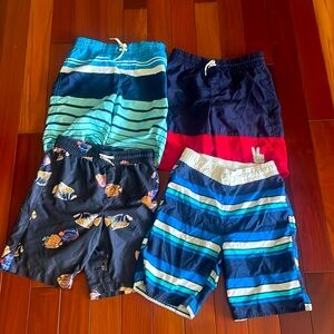 Four Old Navy swim trunks barely worn - Boys Large (10-12)